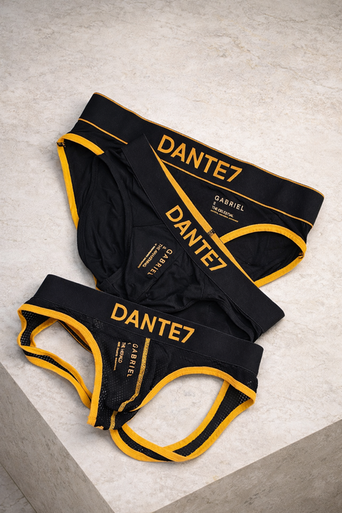 Black and yellow men's underwear set with 'Dante7' branding on a light gray background.
